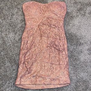 Mini strapless lace dress.